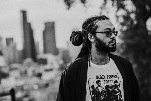 Eli Michaud (me) facing right, t-shirt reads 'Black Panther Party'